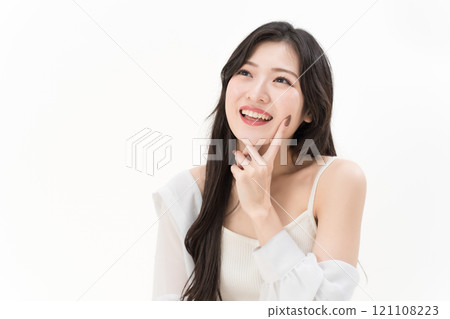 Young woman pointing at her mouth and teeth Dental care Young woman pointing at her mouth and teeth Dental care 121108223
