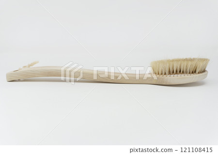 A worn out body brush with shed bristles A worn out body brush with shed bristles 121108415