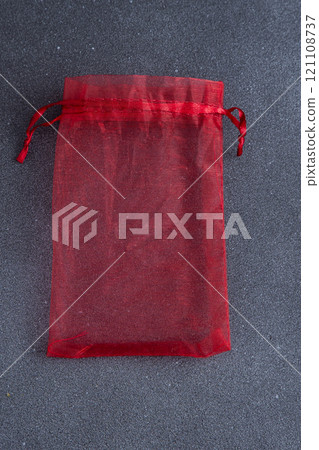 Red organza bag. Fabric for packing jewelry and small gifts. 121108737