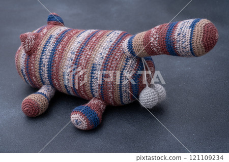 Crocheted toy cat. Melange thread. Hobby: knitting. Funny animal. Crocheted toy cat. Melange thread. Hobby: knitting. Funny animal. 121109234