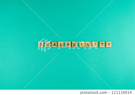 Word scalability. The phrase is laid out in wooden letters. Top view. Motivation. Blue background. Copy space 121110014