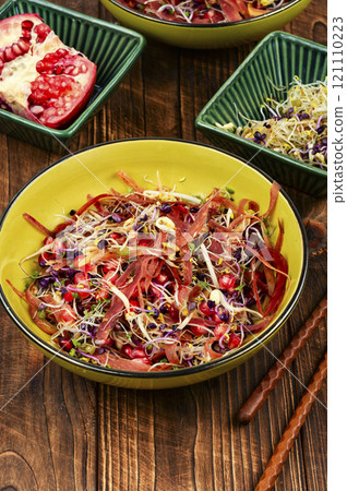Sprouts and pomegranate salad. 121110223
