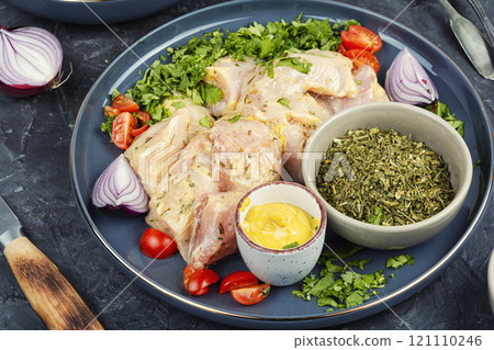 Raw uncooked chicken medallions 121110246