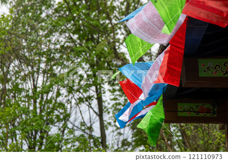 Tibetan colorful flags with prayers. Buddhism. Tibet Prayer Flag. Tibetan colorful flags with prayers. Buddhism. Tibet Prayer Flag. 121110973