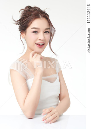 Beautiful young asian woman with clean fresh skin on white background, Face care, Facial treatment, Cosmetology, beauty and spa, Asian women portrait. 121112448