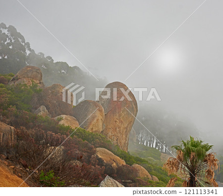 A misty morning on peaceful mountain peak, quiet zen nature with scenic views. Smog covered rocky landscape of Lions Head mountain. The aftermath of a devastating wildfire on a mountain. A misty morning on peaceful mountain peak, quiet zen nature with scenic views. Smog covered rocky landscape of Lions Head mountain. The aftermath of a devastating wildfire on a mountain. 121113341