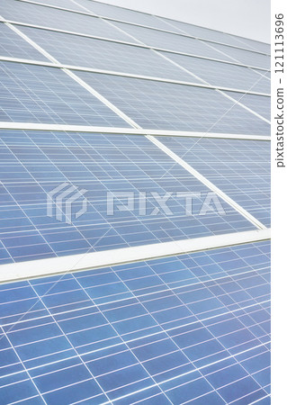 Close up of solar energy power panel. Sustainable green eco friendly renewable energy is generated by sunlight with a technological device. Reusable natural source of power produced by sunlight Close up of solar energy power panel. Sustainable green eco friendly renewable energy is generated by sunlight with a technological device. Reusable natural source of power produced by sunlight 121113696