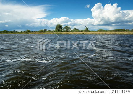 Waves on the lake and clouds on the sky, a May day Waves on the lake and clouds on the sky, a May day 121113979