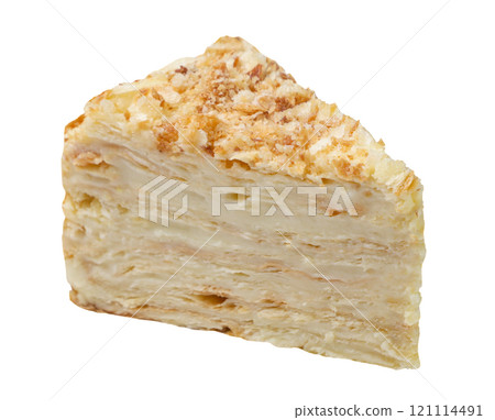 Piece of Napoleon cake close-up on white. Isolated 121114491