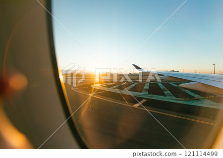 sunrise view from airplane window 121114499