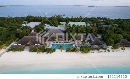 White sand on the beach and a large swimming pool 121114510