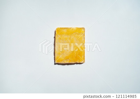 Gold gel rectangle smear on white background 121114985