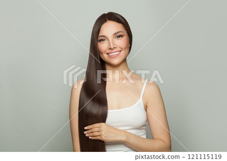 Charming young woman model with natural make-up and long straight brown hair portrait Charming young woman model with natural make-up and long straight brown hair portrait 121115119