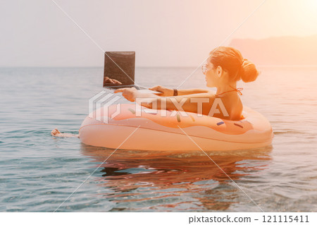 Woman Laptop Floatation Device Ocean Sunset Working Remotely Woman Laptop Floatation Device Ocean Sunset Working Remotely 121115411