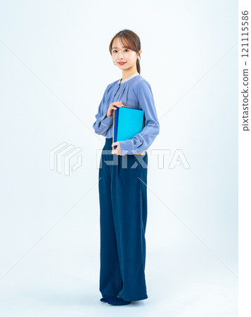 Full body photo of a woman holding a file 121115586