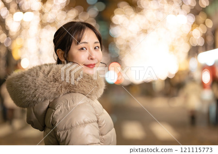 A smiling woman among the illuminations A smiling woman among the illuminations 121115773