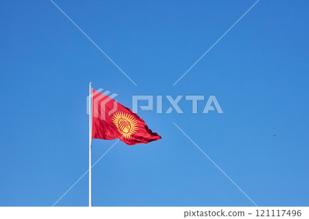 The main symbol of the Kyrgyz Republic. Kyrgyzstan Flag fluttering in the wind The main symbol of the Kyrgyz Republic. Kyrgyzstan Flag fluttering in the wind 121117496