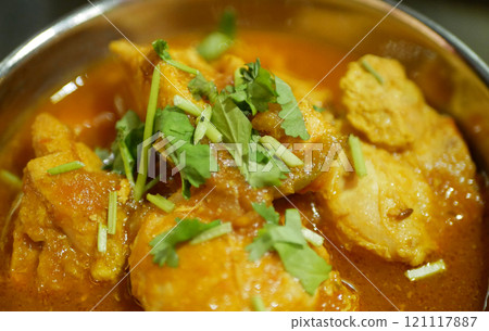 Curry chicken Nepali Rogan Josh food spicy fennel seeds dried ginger powder vegetable meal Nepalese plate orange sauce Nepal, tomato dish cooking carrots of meat spices Indian, Central Asian cook Curry chicken Nepali Rogan Josh food spicy fennel seeds dried ginger powder vegetable meal Nepalese plate orange sauce Nepal, tomato dish cooking carrots of meat spices Indian, Central Asian cook 121117887