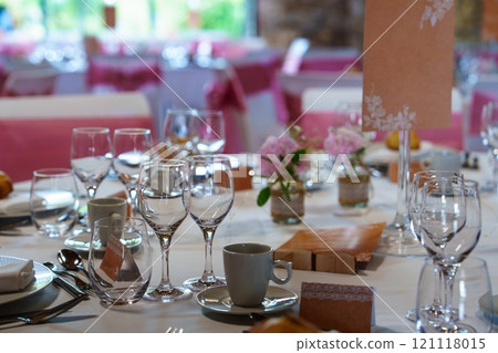 Elegant Table Setting with Pink and White Floral Centerpiece for Special Occasions and Celebrations Elegant Table Setting with Pink and White Floral Centerpiece for Special Occasions and Celebrations 121118015