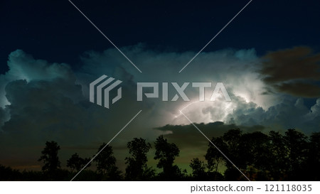 Dramatic Night Sky Aglow with Forked Lightning over the Beautiful Nedherlands Landscape 121118035