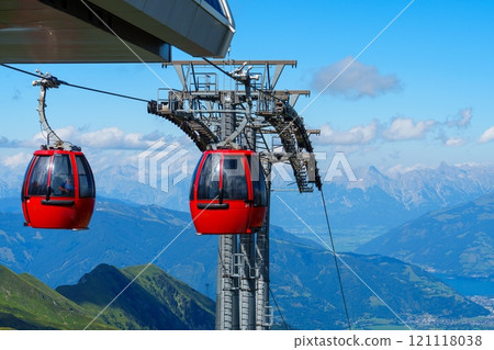 Modern red cable car cabins with a view of the Austrian Alps in Kaprun, Zell am See, Austria 121118038