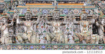 Yaksha and monkey supporting figures decorating the prang of the Arun Temple in Bangkok, Thailand Yaksha and monkey supporting figures decorating the prang of the Arun Temple in Bangkok, Thailand 121118513