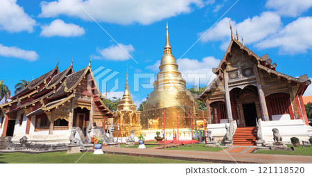 Chapel and golden pagoda at Wat Phra Singh Woramahawihan, Chiang Mai, Thailand Chapel and golden pagoda at Wat Phra Singh Woramahawihan, Chiang Mai, Thailand 121118520