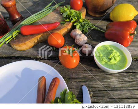 Vegetables and fruits are spices on a sliced board. High quality photo 121118859