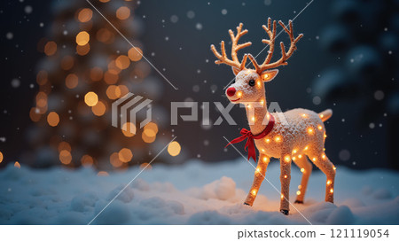 Deer doll decorated with Christmas lights outside with falling snow. Christmas background. 121119054