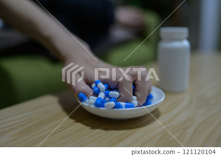 Overdose, OD image, woman taking a large amount of medicine, drug overdose, stress, depression, overtime, fatigue, overwork Overdose, OD image, woman taking a large amount of medicine, drug overdose, stress, depression, overtime, fatigue, overwork 121120104