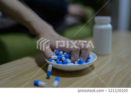 Overdose, OD image, woman taking a large amount of medicine, drug overdose, stress, depression, overtime, fatigue, overwork Overdose, OD image, woman taking a large amount of medicine, drug overdose, stress, depression, overtime, fatigue, overwork 121120105