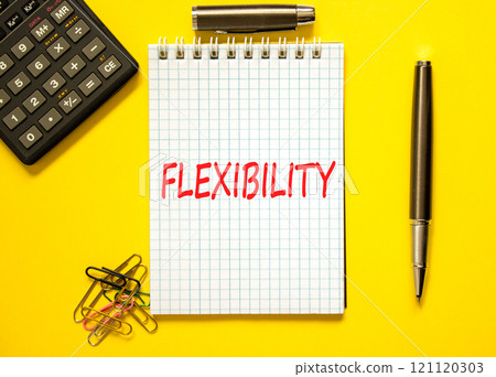 Flexibility symbol. Concept word Flexibility on beautiful white note. Beautiful yellow paper background. Black calculator. Black pen. Business flexibility concept. Copy space. Flexibility symbol. Concept word Flexibility on beautiful white note. Beautiful yellow paper background. Black calculator. Black pen. Business flexibility concept. Copy space. 121120303