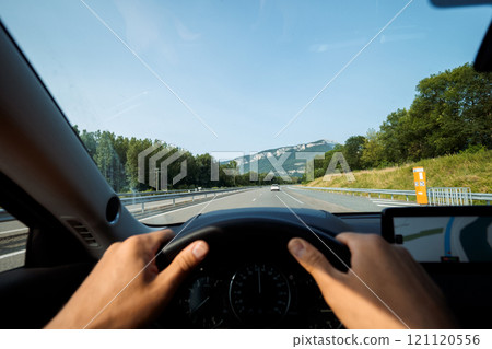 Driving view of open highway Driving view of open highway 121120556
