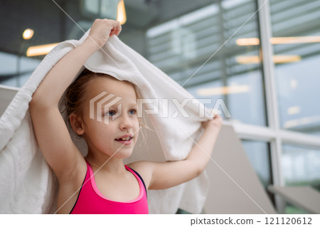 Young girl drying with towel Young girl drying with towel 121120612