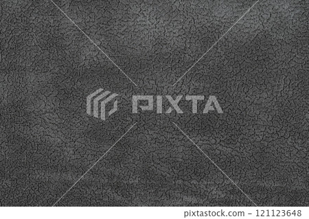 Black color fabric cloth with short pile fluffy and soft abstract texture background. Close-up photography of dark gray colored surface fabric material, colored background texture of cloth for design 121123648