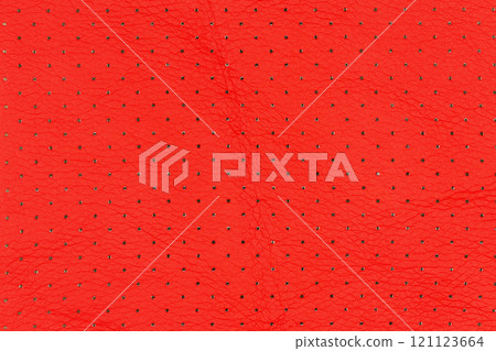 Bright red color abstract artificial leather with small dots and holes pattern for background. Close-up view of vibrant red breathable surface simulated leather material, background for design element Bright red color abstract artificial leather with small dots and holes pattern for background. Close-up view of vibrant red breathable surface simulated leather material, background for design element 121123664