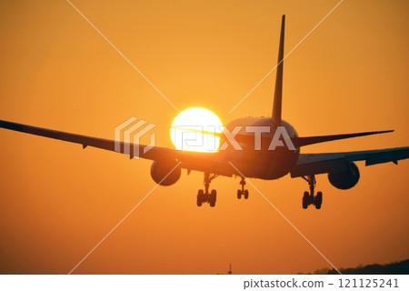 Sunset and airplane Sunset and airplane 121125241
