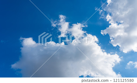 White clouds flowing in the blue sky White clouds flowing in the blue sky 121125580