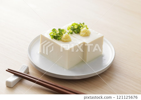 Cold silken tofu topped with spring onions and ginger Cold silken tofu topped with spring onions and ginger 121125676
