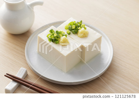 Cold silken tofu topped with spring onions and ginger Cold silken tofu topped with spring onions and ginger 121125678