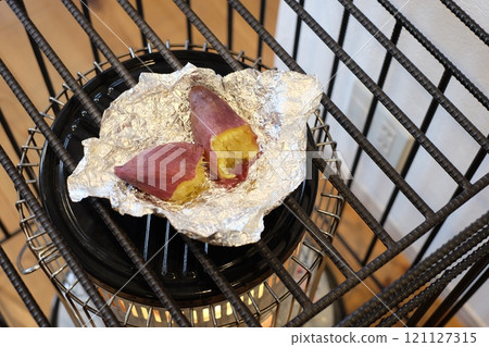 Stove-roasted sweet potato Stove-roasted sweet potato 121127315