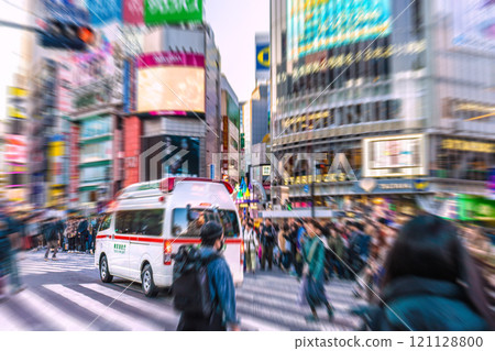 Tokyo cityscape in Japan: Pedestrians crossing the street...even when an ambulance with its siren blaring approaches...=Shibuya, 7th 121128800