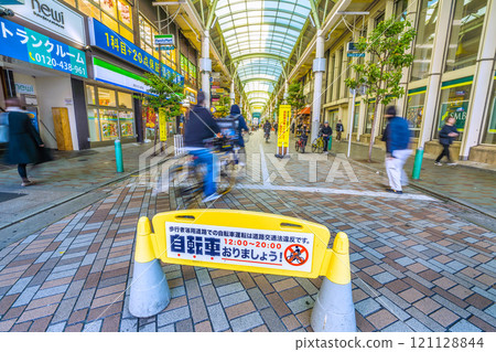 Tokyo cityscape in Japan December... Akabane Station front LaLa Garden "Let's get off our bikes!"... = 7th 121128844