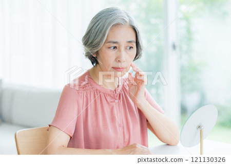 Worried senior woman 121130326
