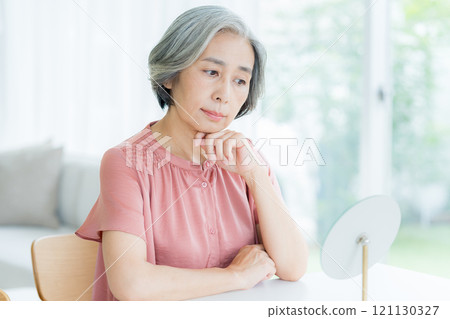 Worried senior woman 121130327