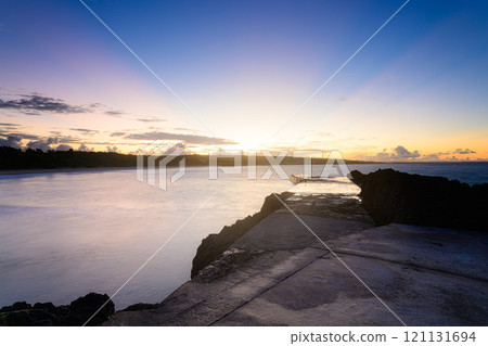 Sunrise seen from the beach at Toguchi Beach Sunrise seen from the beach at Toguchi Beach 121131694
