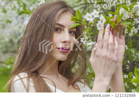 Beauty portrait of young woman with natural make-up and long smooth straight hair posing Beauty portrait of young woman with natural make-up and long smooth straight hair posing 121132886