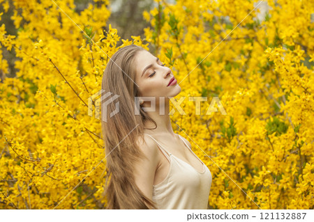 Pretty young woman with natural make-up and long smooth straight hair posing Pretty young woman with natural make-up and long smooth straight hair posing 121132887
