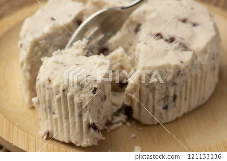 Lift the fresh cheese with a fork Lift the fresh cheese with a fork 121133136