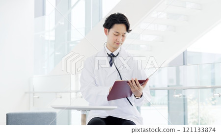 Male doctor working in the medical field 121133874